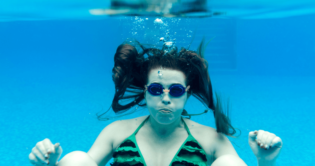 Can You Breathe Pure Oxygen-girl under water holding breath 